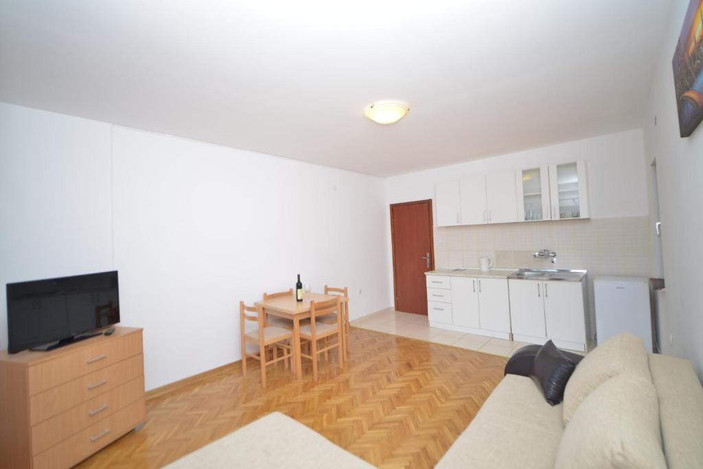 Kuchyň nebo kuchyňský kout v ubytování Apartments Villa Illyrik