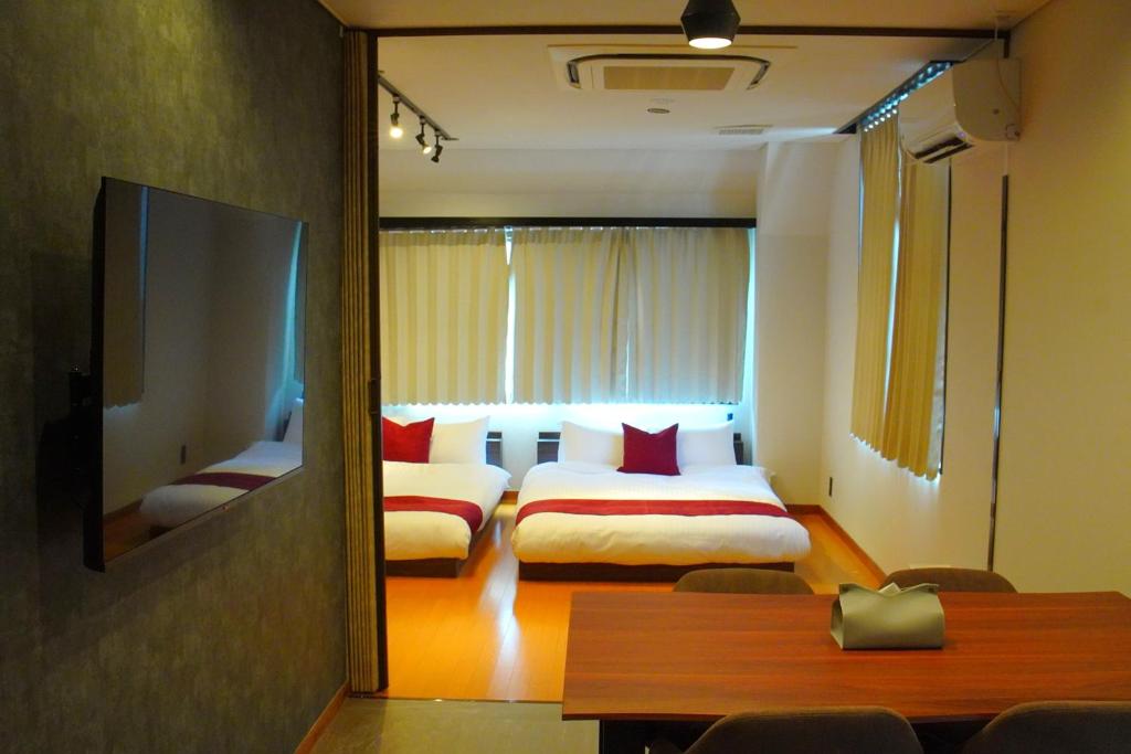 Postel nebo postele na pokoji v ubytování Kototoki-Ren-302 Standard Twin room