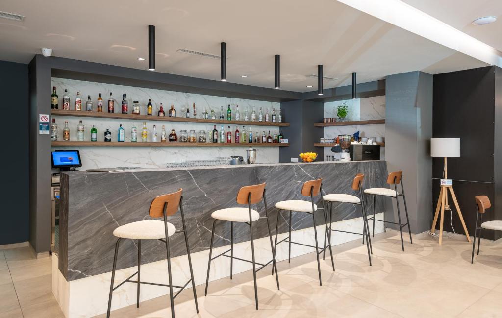 Lounge nebo bar v ubytování Hotel Ivka