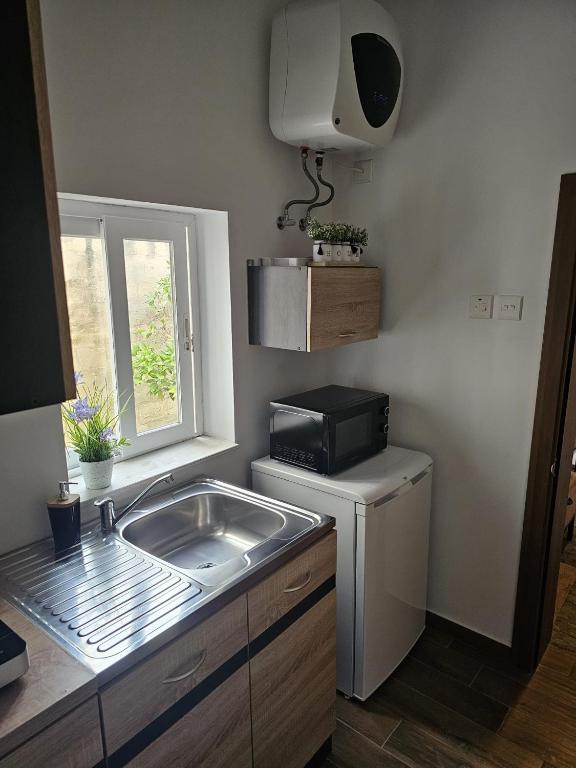 Kuchyň nebo kuchyňský kout v ubytování Modern studio near Valleta