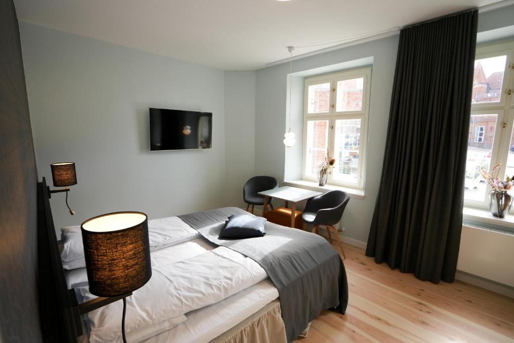TV a/nebo společenská místnost v ubytování Hotel Ringkøbing