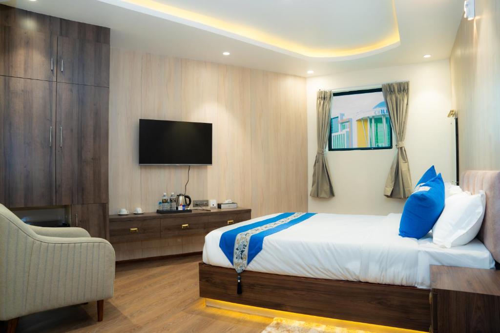 TV a/nebo společenská místnost v ubytování Hotel Smart Durbar