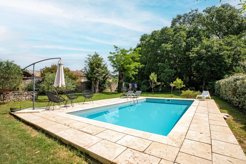 Swimmingpoolen hos eller tæt på Villa spacieuse avec piscine privée