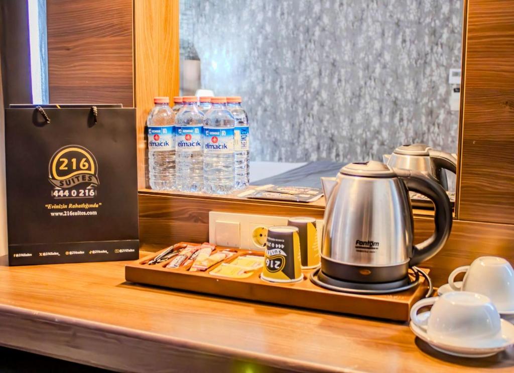 Příslušenství pro přípravu čaje a kávy v ubytování Ma City Hotel