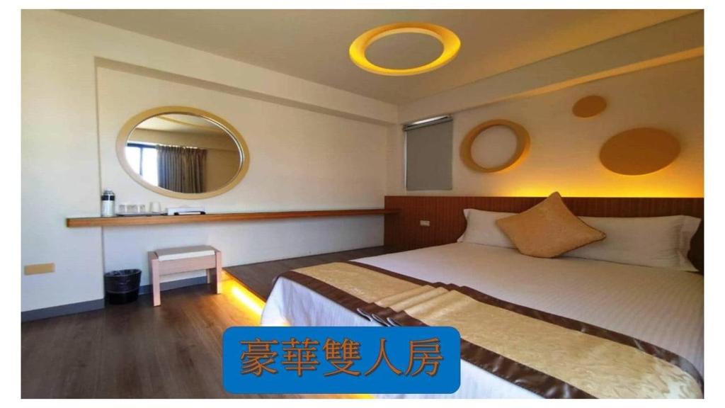 Postel nebo postele na pokoji v ubytování 海漣天海岸民宿 & 水連天海景電梯民宿 Sea Sky Coast Homestay & Shui-lian-tian Homestay