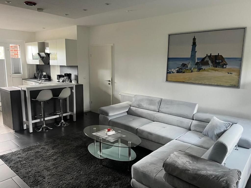 Posezení v ubytování Ferienwohnung Lüttje Huuske