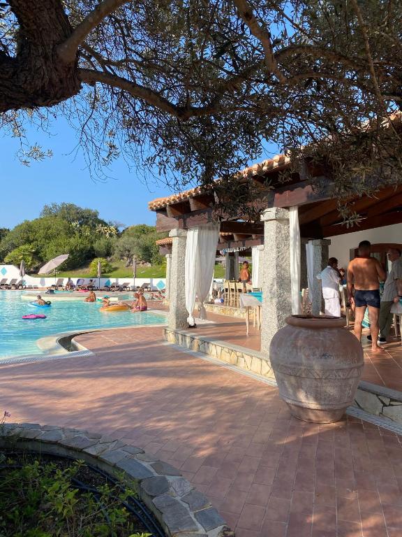 Bazén v ubytování Le Rocce Antiche Hotel Resort nebo v jeho okolí