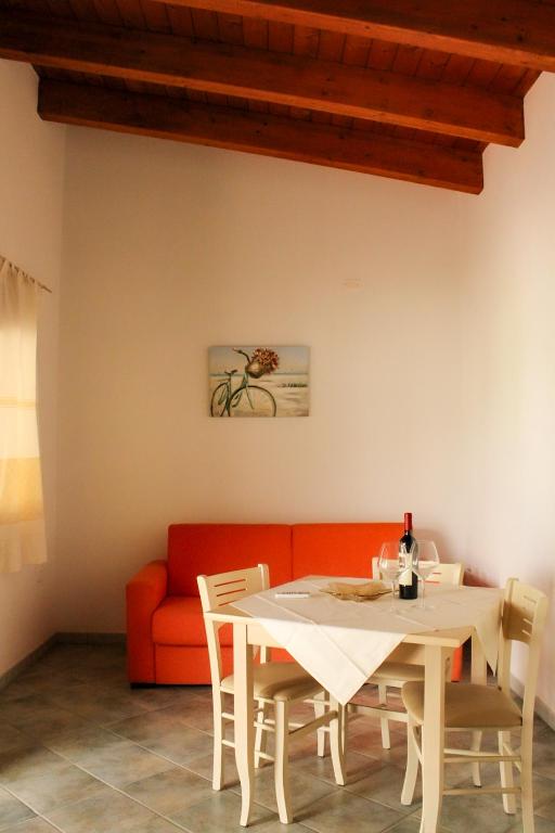 Posezení v ubytování Le Rocce Antiche Hotel Resort