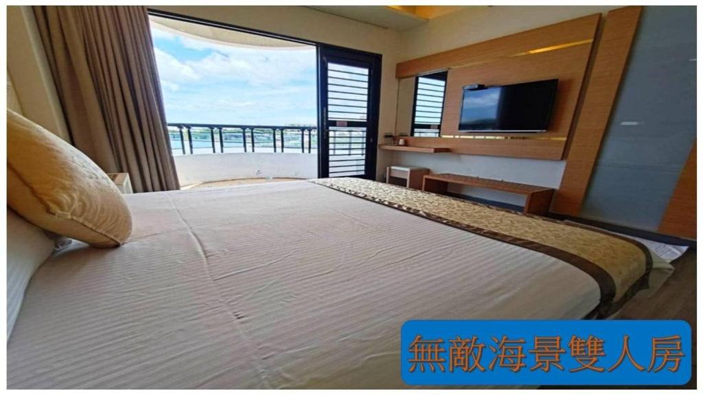 Postel nebo postele na pokoji v ubytování 海漣天海岸民宿 & 水連天海景電梯民宿 Sea Sky Coast Homestay & Shui-lian-tian Homestay