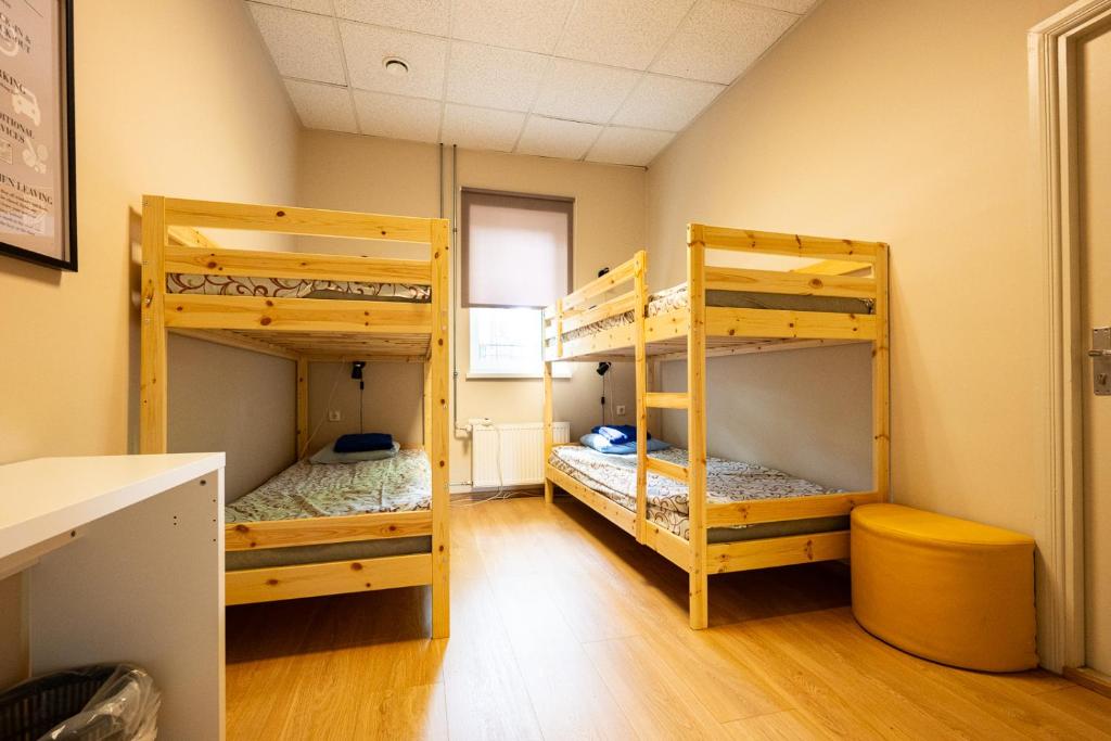 Postel nebo postele na pokoji v ubytování Tamme staadioni hostel