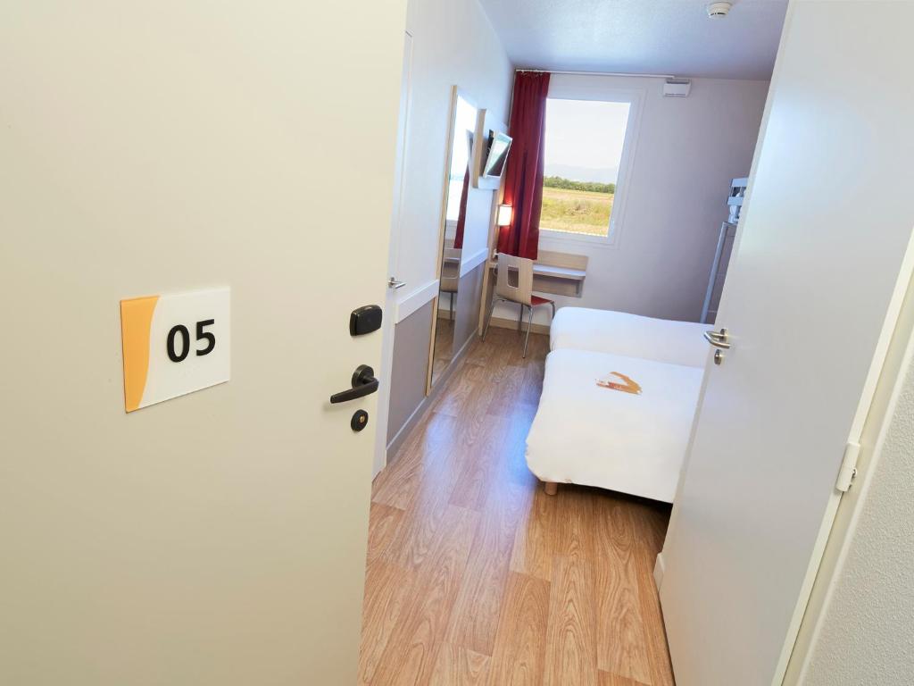 Postel nebo postele na pokoji v ubytování Premiere Classe Valence Nord - Saint Marcel Les Valence