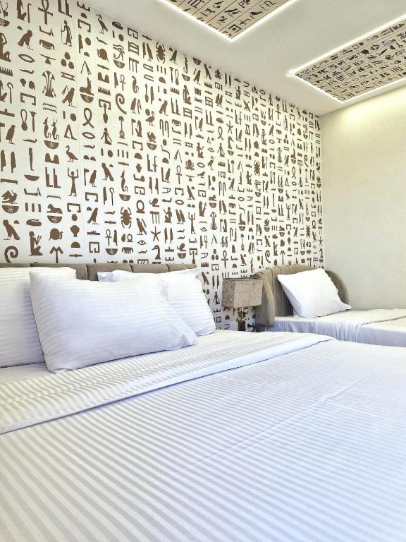 Letto o letti in una camera di Miami Pyramids View