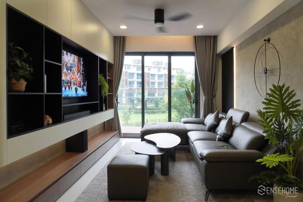 a living room with couches and a flat screen tv at Nhà của Hải - Apartment Luxury Diamond Brilliant in Ho Chi Minh City
