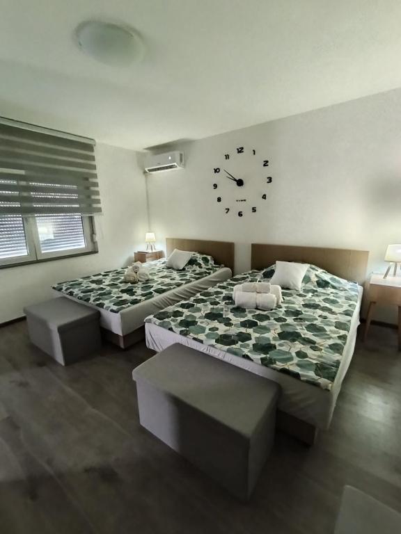 Ένα ή περισσότερα κρεβάτια σε δωμάτιο στο Apartman Dragićević - Stan na dan