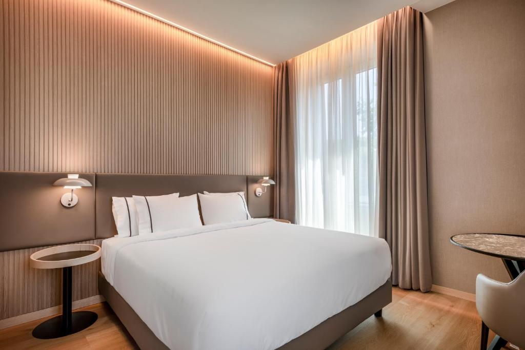 Postel nebo postele na pokoji v ubytování AC Hotel by Marriott Cartagena