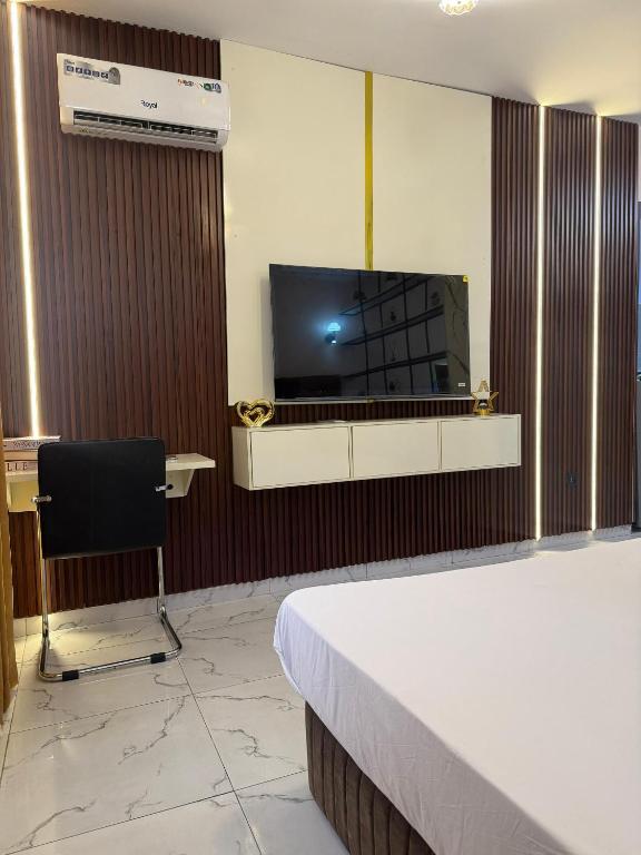 TV a/nebo společenská místnost v ubytování Cozy Studio in GRA - Portharcourt