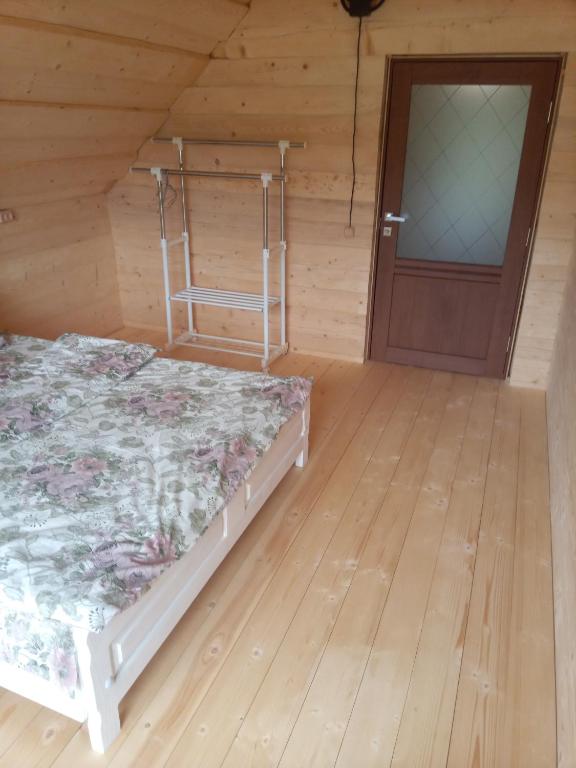 Postel nebo postele na pokoji v ubytování Sadyba u Vani