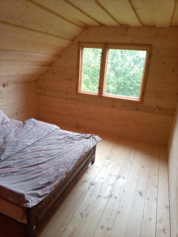 Postel nebo postele na pokoji v ubytování Sadyba u Vani