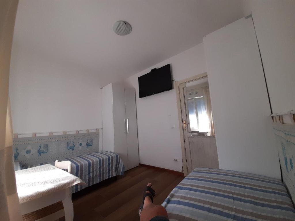 Postel nebo postele na pokoji v ubytování La Pervinca