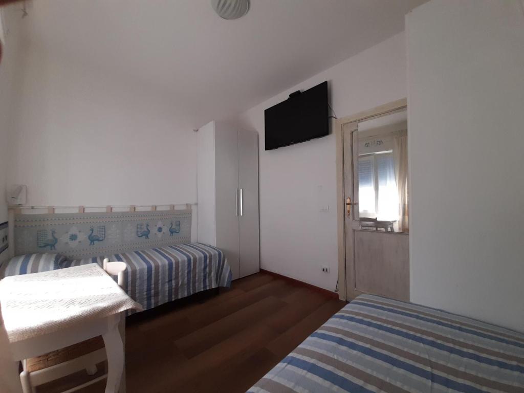 Postel nebo postele na pokoji v ubytování La Pervinca