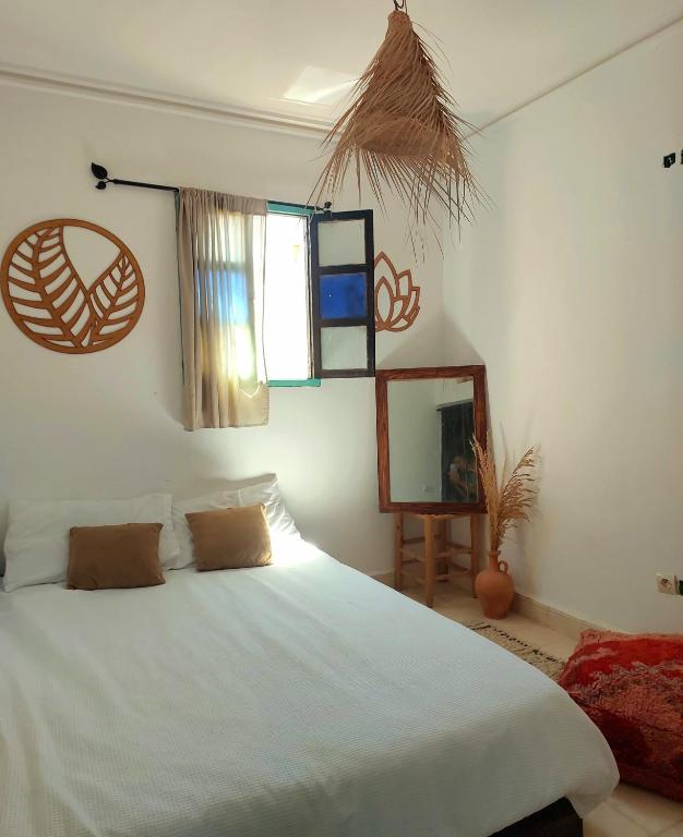 Postel nebo postele na pokoji v ubytování Moroccan Boho Surf House