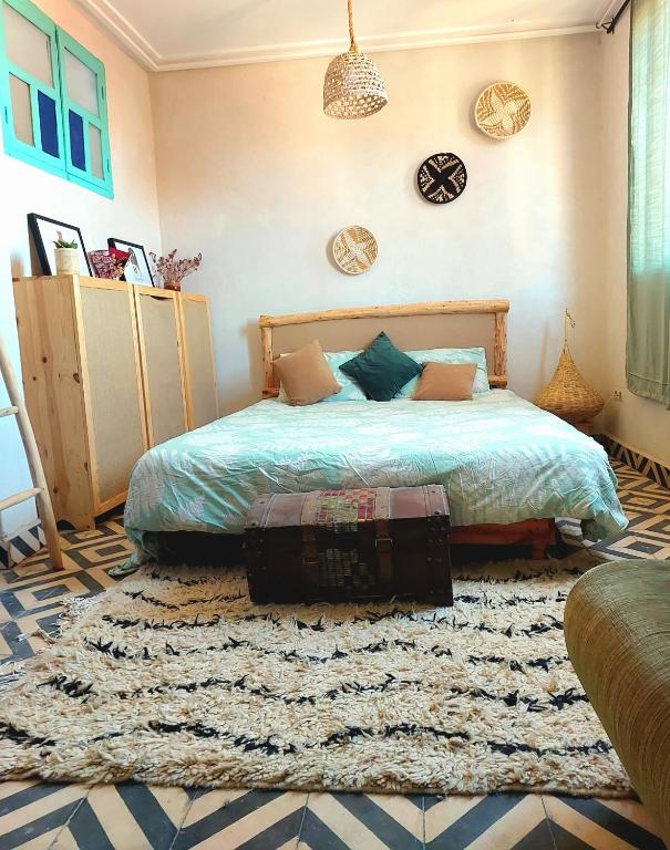 Postel nebo postele na pokoji v ubytování Moroccan Boho Surf House