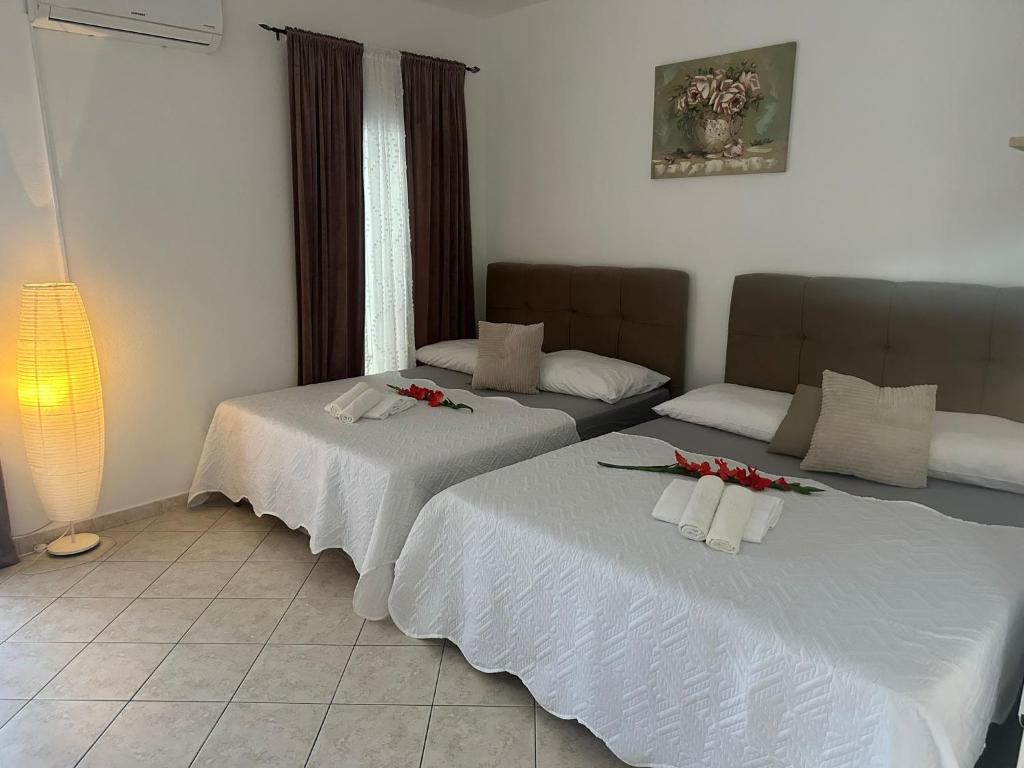 Postel nebo postele na pokoji v ubytování Apartments Vinea