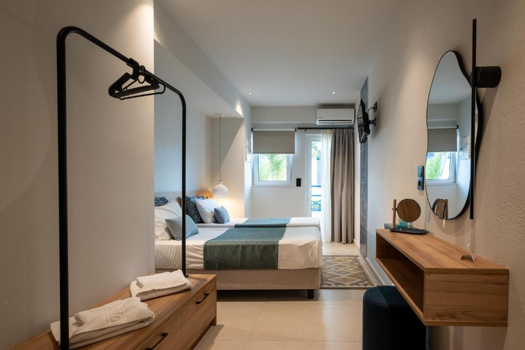 Postel nebo postele na pokoji v ubytování Psaras Apartments