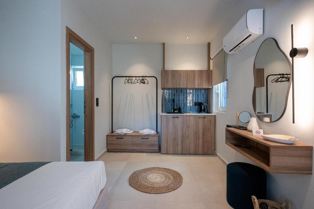 Postel nebo postele na pokoji v ubytování Psaras Apartments