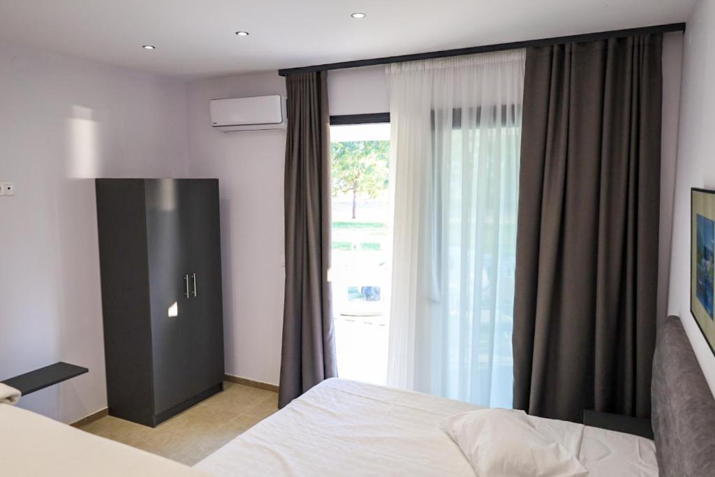 Fotografie z fotogalerie ubytování Sithonia Palace Apartments v destinaci Ormília