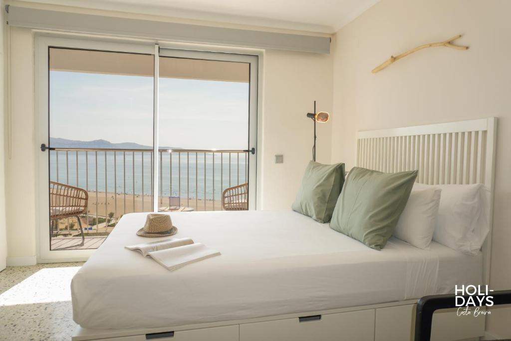 Postel nebo postele na pokoji v ubytování Holidays P14 Sea View