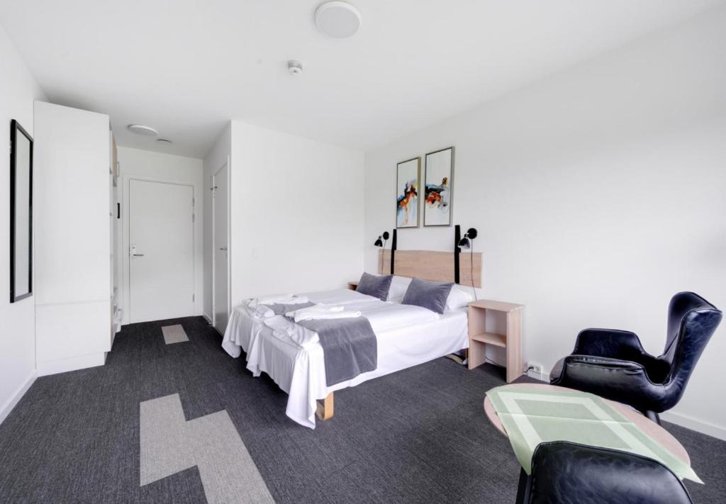 Ένα ή περισσότερα κρεβάτια σε δωμάτιο στο Hotel Vissenbjerg Storkro