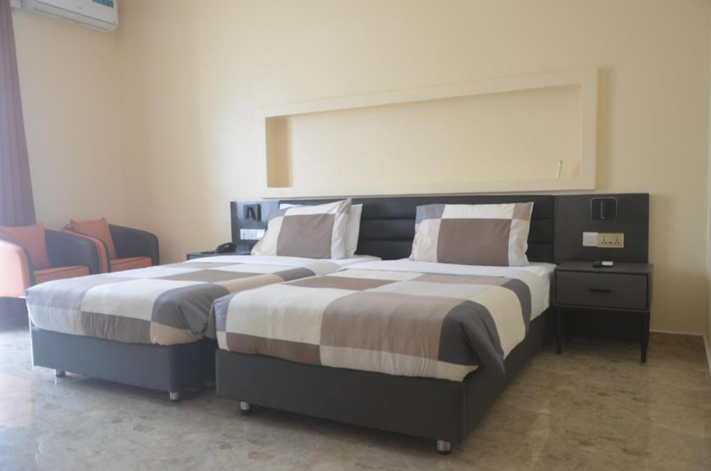 Postel nebo postele na pokoji v ubytování Hotel Speranza