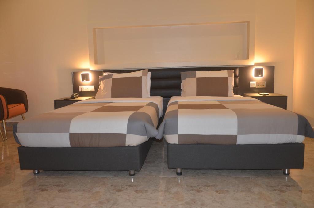Postel nebo postele na pokoji v ubytování Hotel Speranza