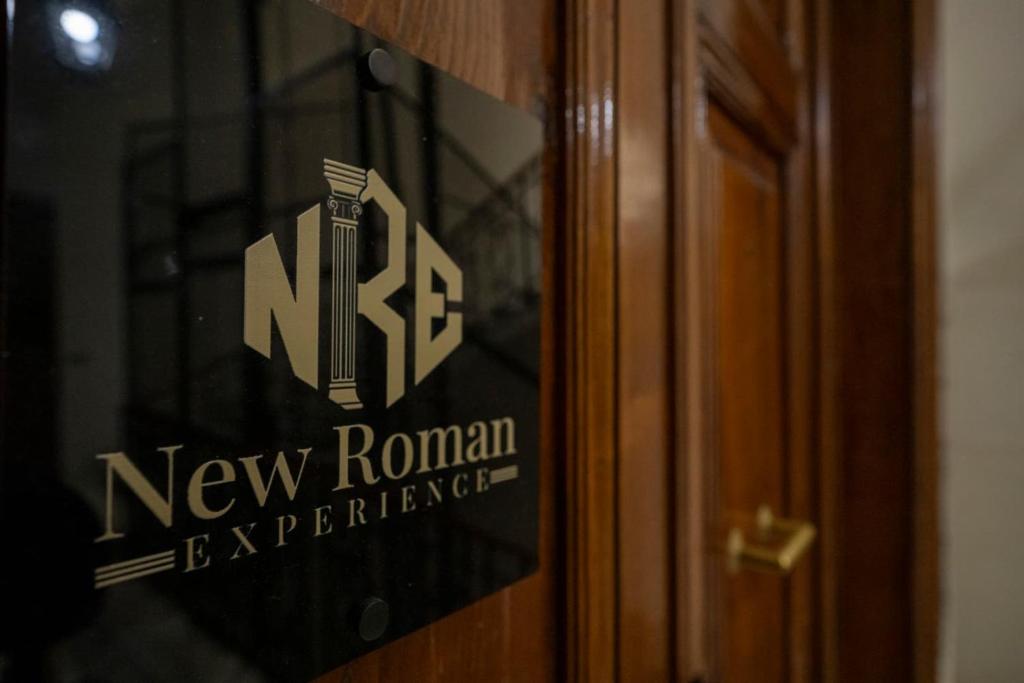 a sign on the door of a new roman interpreter at New Roman Experience in Rome