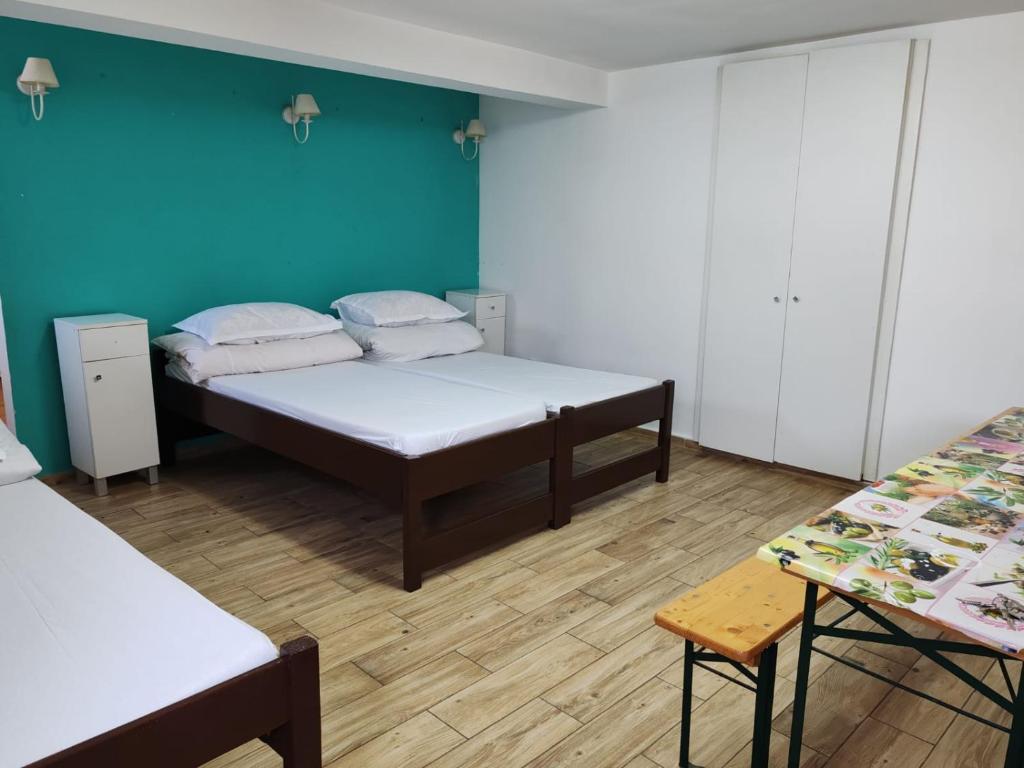 Postel nebo postele na pokoji v ubytování Casa Muresan