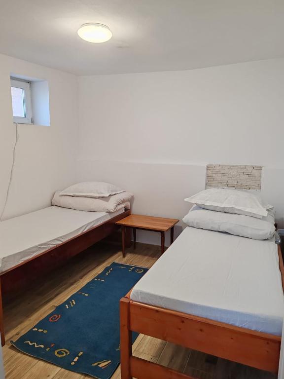 Postel nebo postele na pokoji v ubytování Casa Muresan