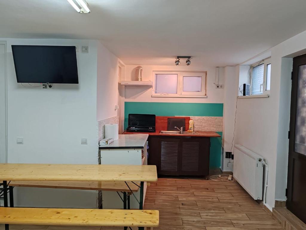 Kuchyň nebo kuchyňský kout v ubytování Casa Muresan