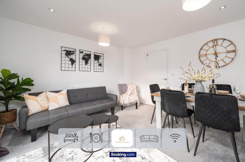 a living room with a couch and a table at 3 Bedroom House By The Yuma Homes Short Lets & Serviced Accommodation In Kent With Wifi & Parking in Ashford