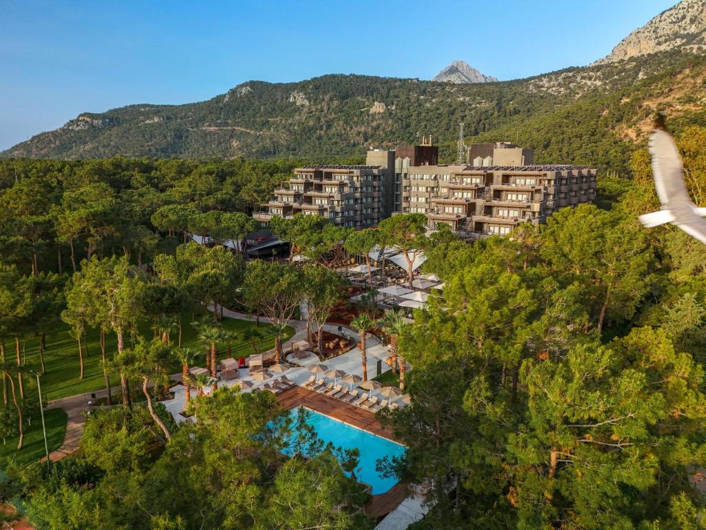 an aerial view of a resort with a pool at Balmy Foresta in Beldibi