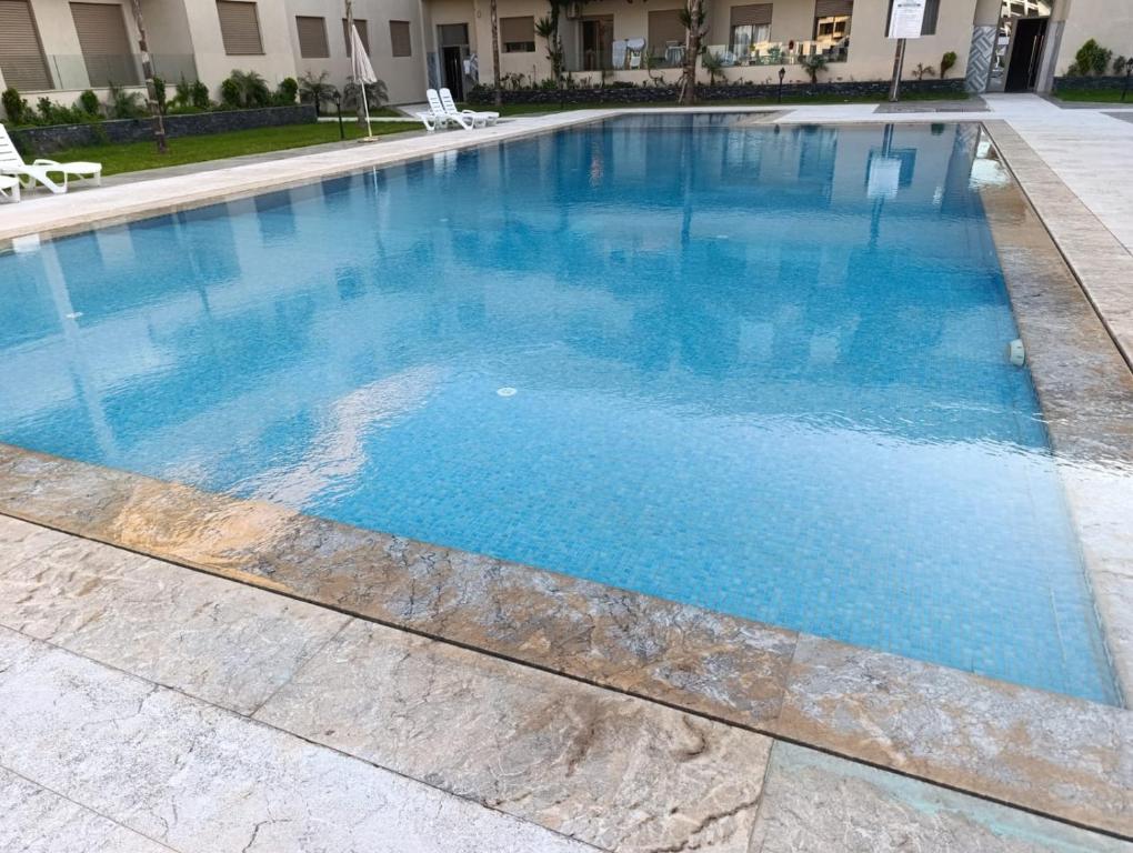 Πισίνα στο ή κοντά στο Appartement avec piscine proche plage oued cherrat