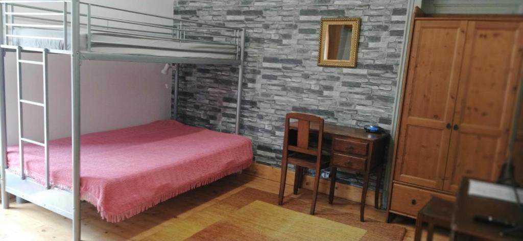 Postel nebo postele na pokoji v ubytování Appartements au bord de la rivière