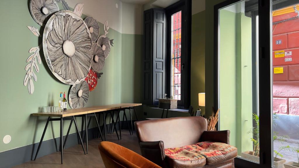 A seating area at Joya del Casco Boutique Hotel by Shiadu