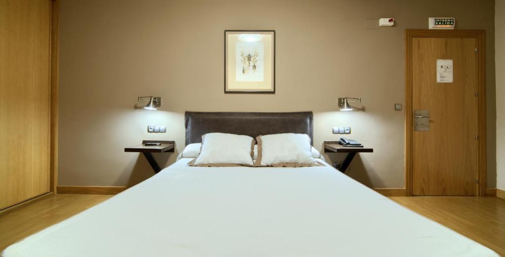 Postel nebo postele na pokoji v ubytování Hotel Rural Izar Ondo