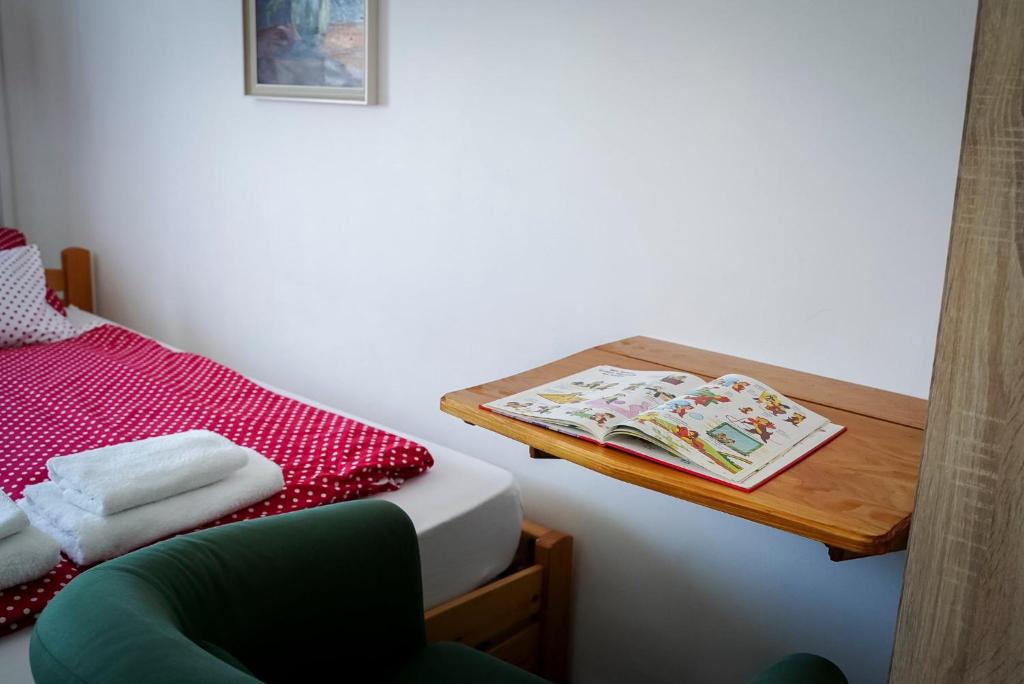 Ένα ή περισσότερα κρεβάτια σε δωμάτιο στο Mézeskuckó