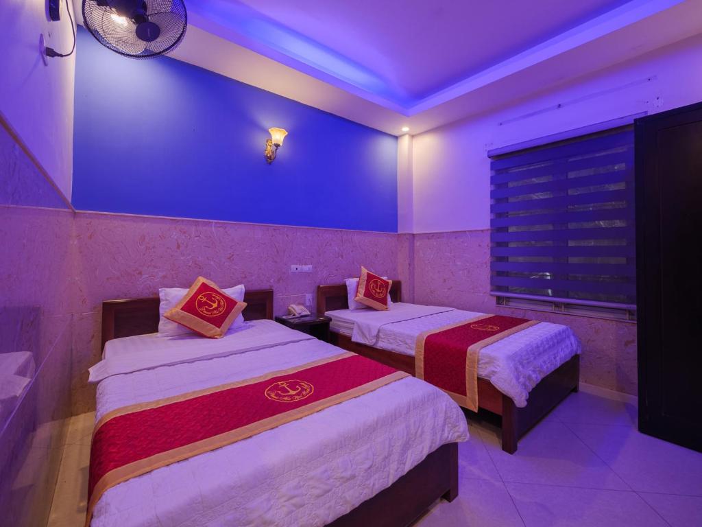 Postel nebo postele na pokoji v ubytování TITANIC HOTEL