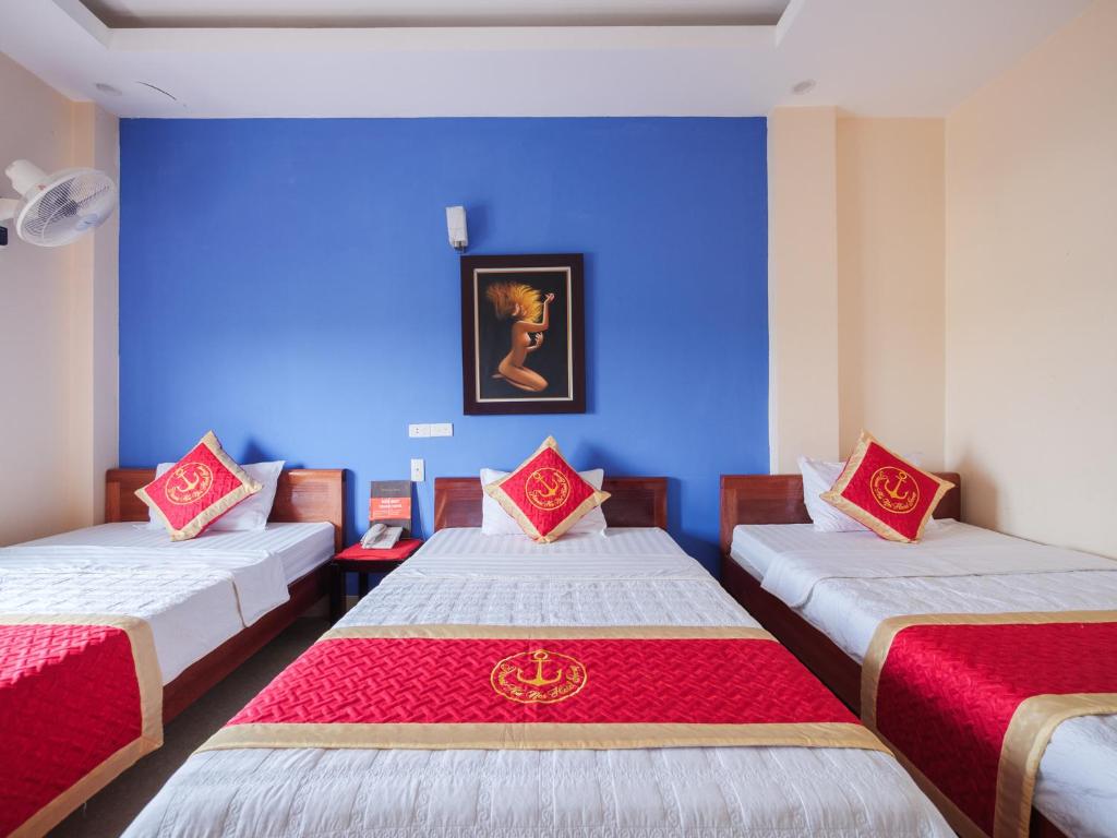 Postel nebo postele na pokoji v ubytování TITANIC HOTEL