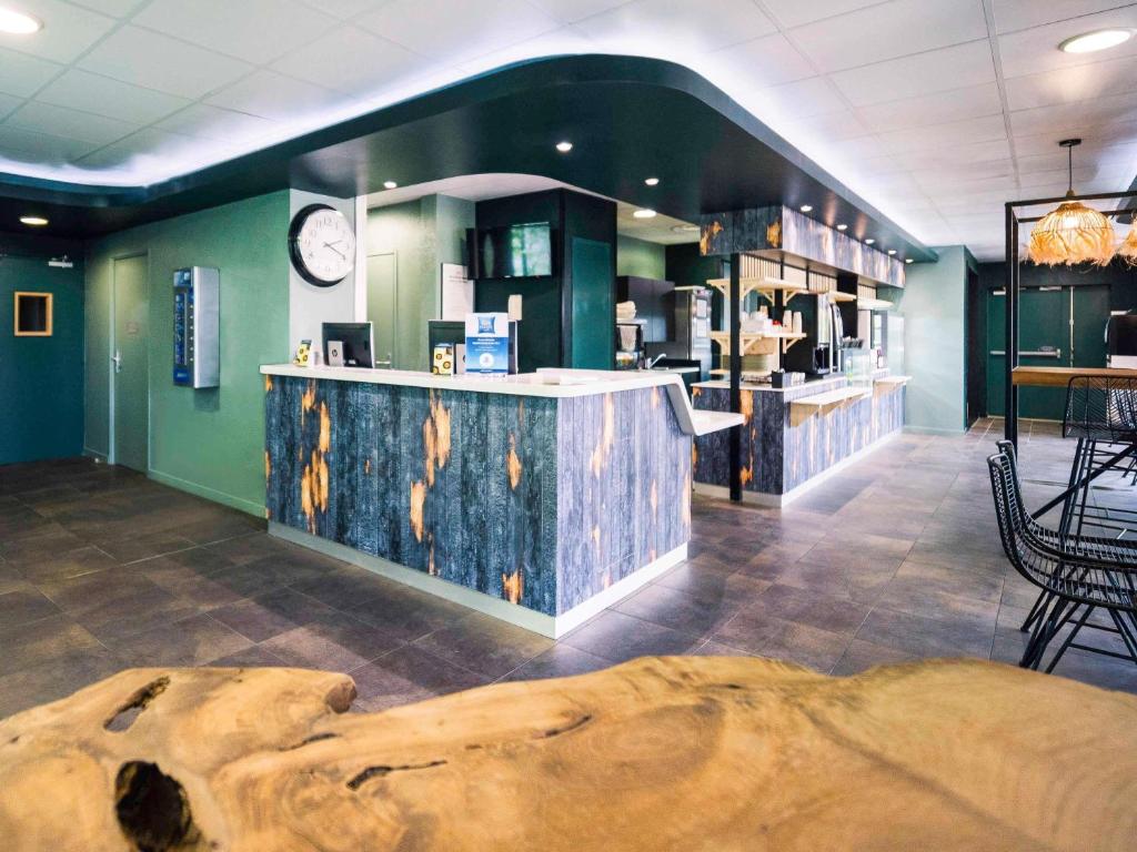 Lounge nebo bar v ubytování ibis budget Bordeaux Aéroport