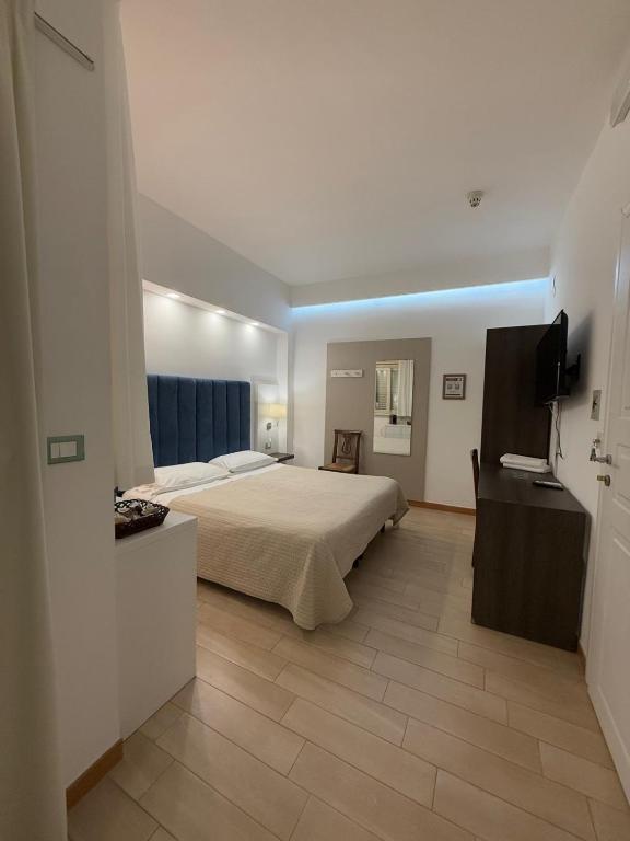 Postel nebo postele na pokoji v ubytování IG-Tysandros Hotel Apartments