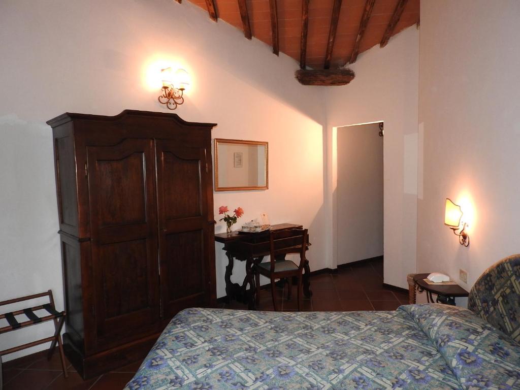Posteľ alebo postele v izbe v ubytovaní Relais Borgo Di Toiano